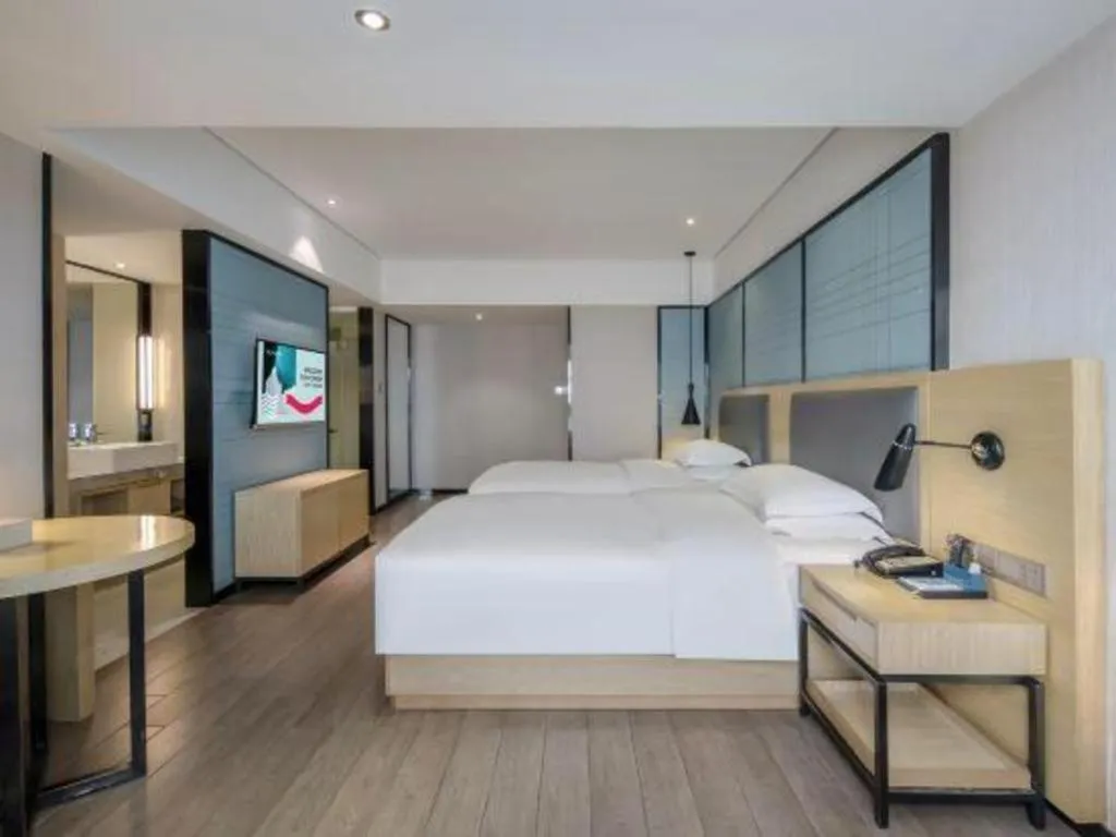 Bed in Echarm Hotel Beihai Railway Station