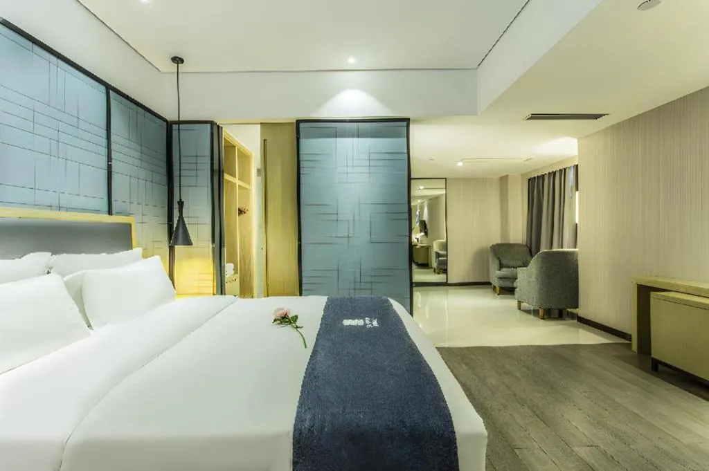 Bed in Echarm Hotel Beihai Railway Station