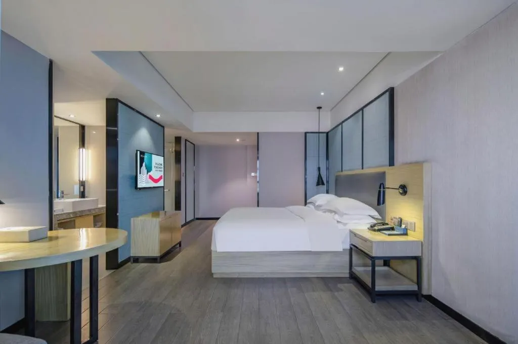 Bed in Echarm Hotel Beihai Railway Station