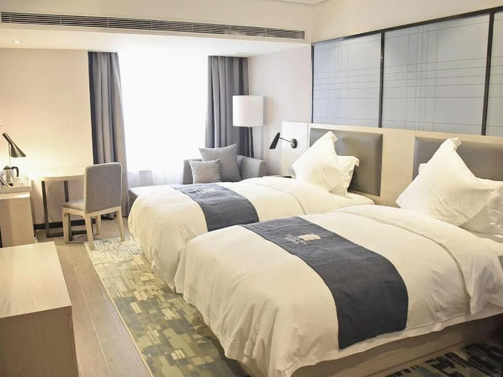 Bed in Echarm Hotel Beihai Railway Station