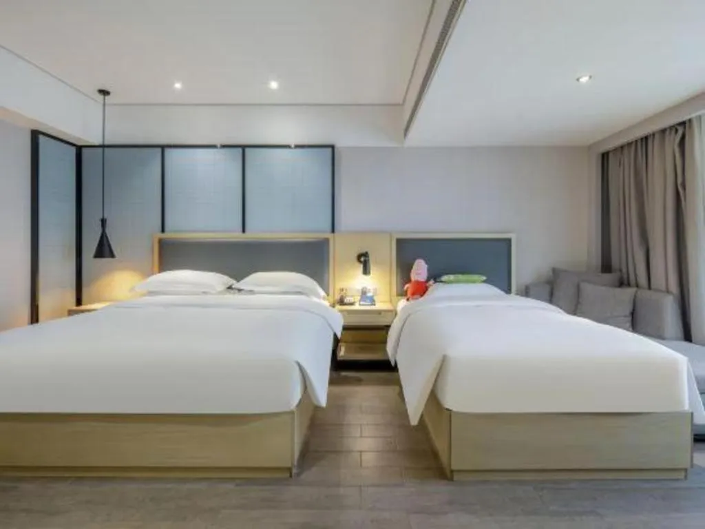 Bed in Echarm Hotel Beihai Railway Station