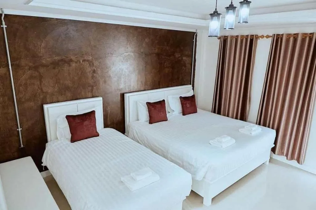 Bed in 111 Resort and Spa