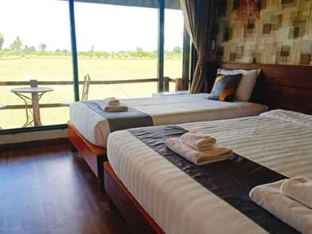 Bed in 111 Resort and Spa
