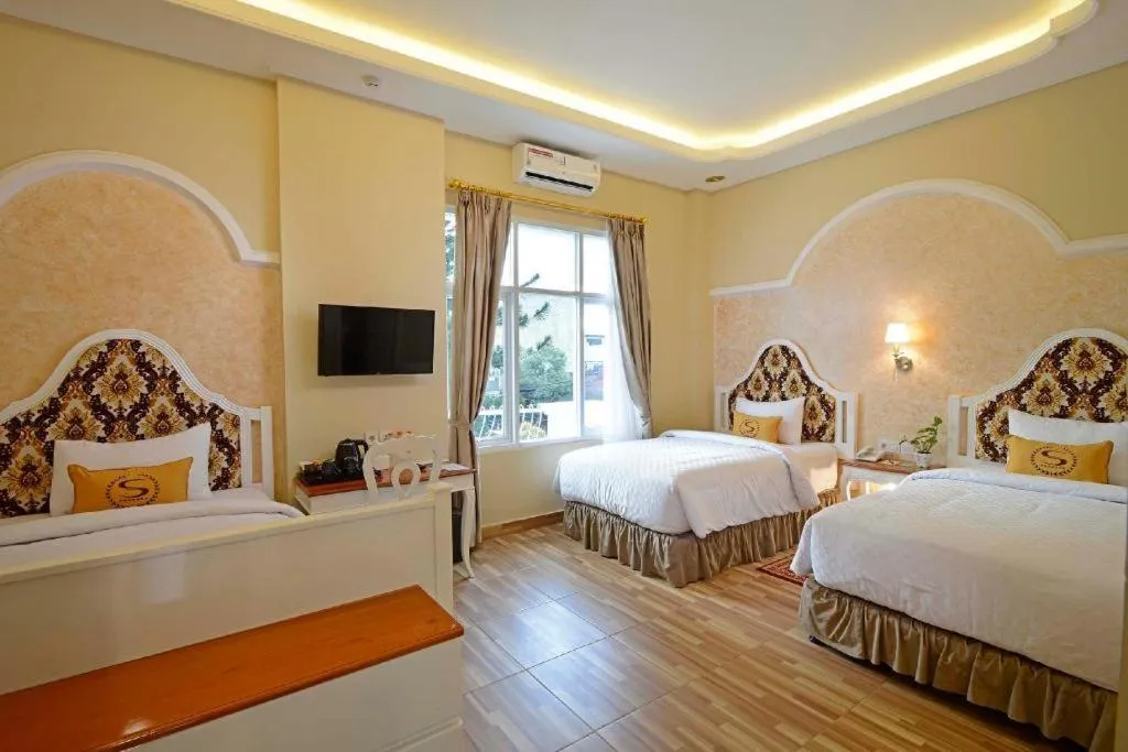 Bed in Sahira Hotel Pakuan