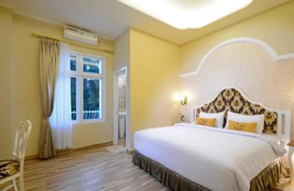 Bed in Sahira Hotel Pakuan