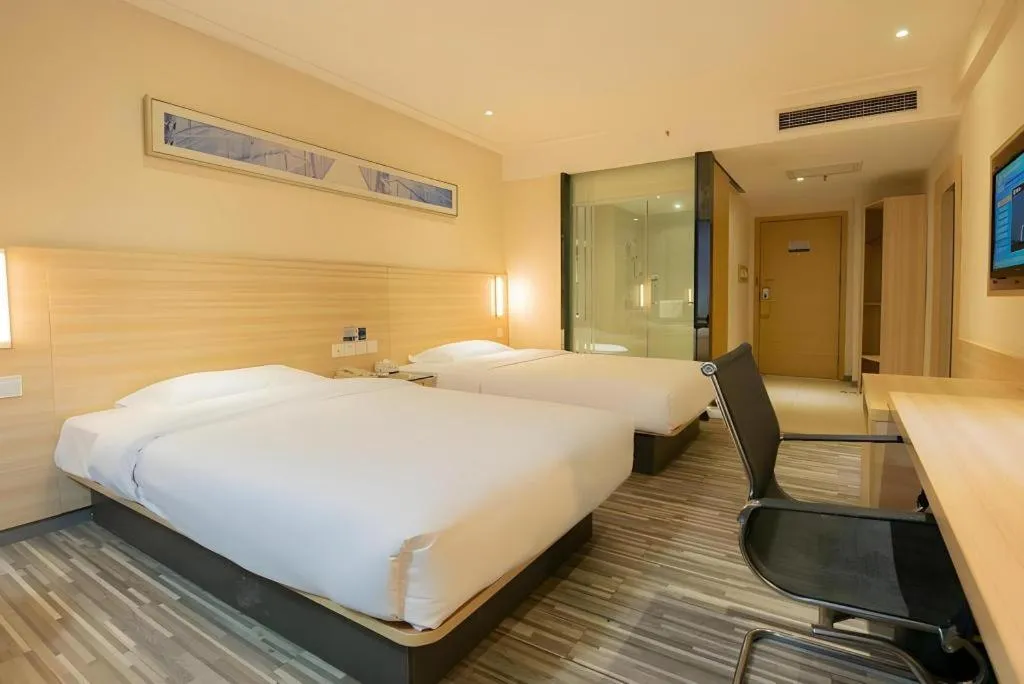 Bed in City Comfort Inn Changsha Tangshuili Fuyou