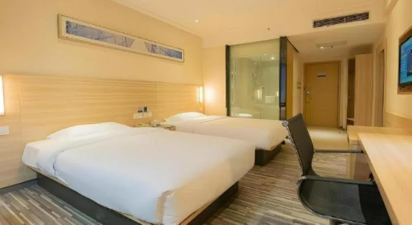 Bed in City Comfort Inn Changsha Tangshuili Fuyou