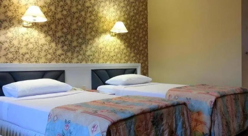 Bed in Wangtai Hotel