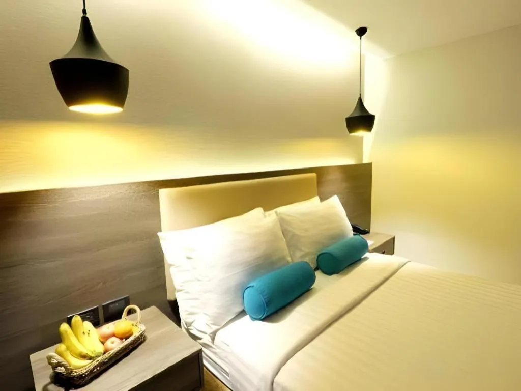 Bed in Home Crest Hotel