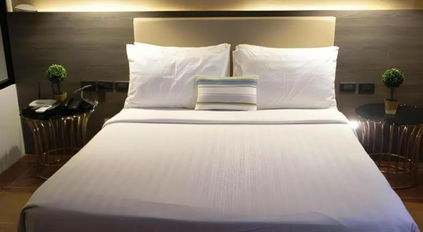 Bed in Home Crest Hotel