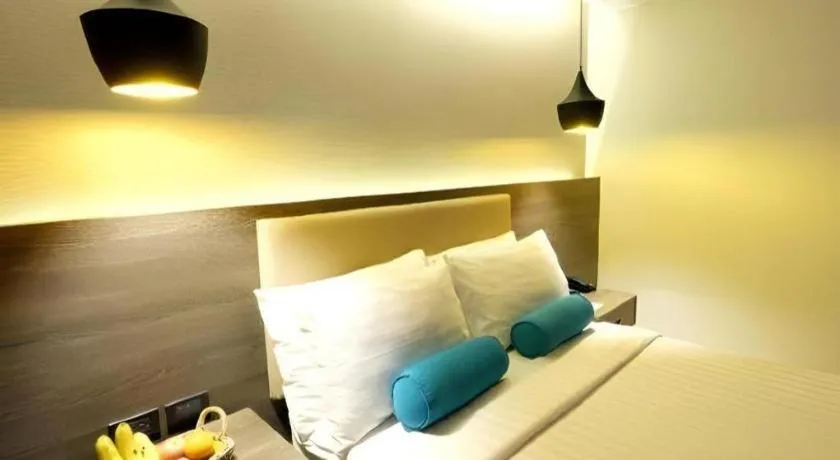 Bed in Home Crest Hotel