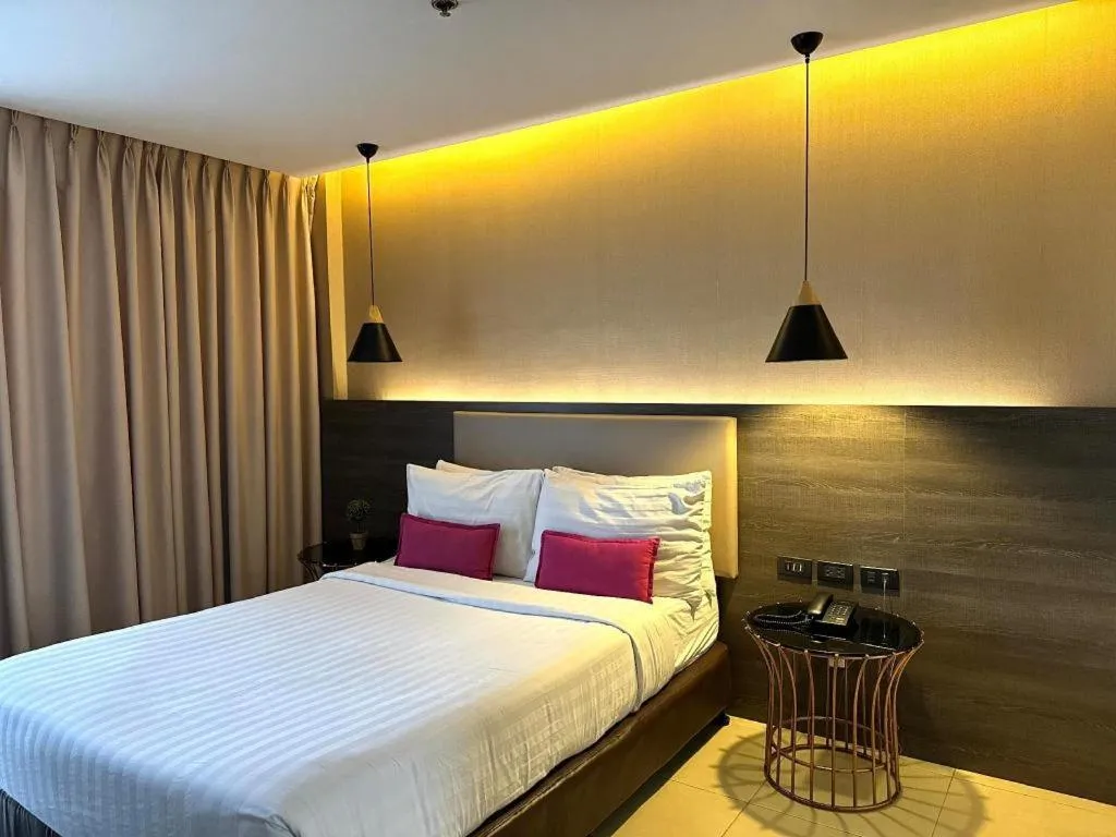 Bed in Home Crest Hotel