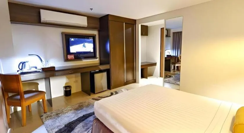 Bed in Home Crest Hotel