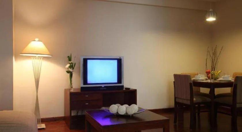 Bed in Amorsolo Mansion Hotel