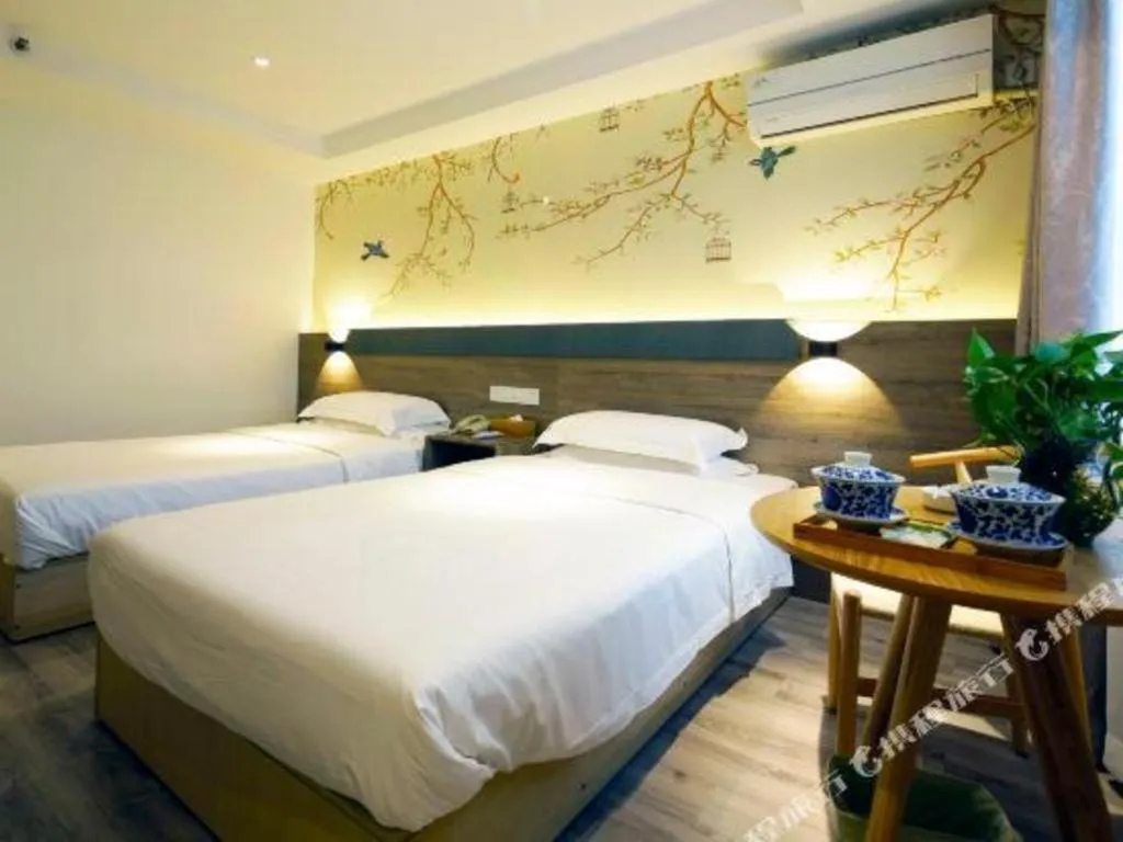 Bed in Anyi 158 Hotel Fuqin