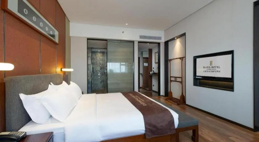 Bed in Rezen Hotel Pasonda Junyu