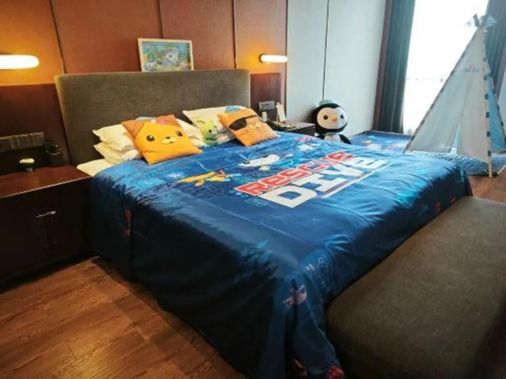 Bed in Rezen Hotel Pasonda Junyu