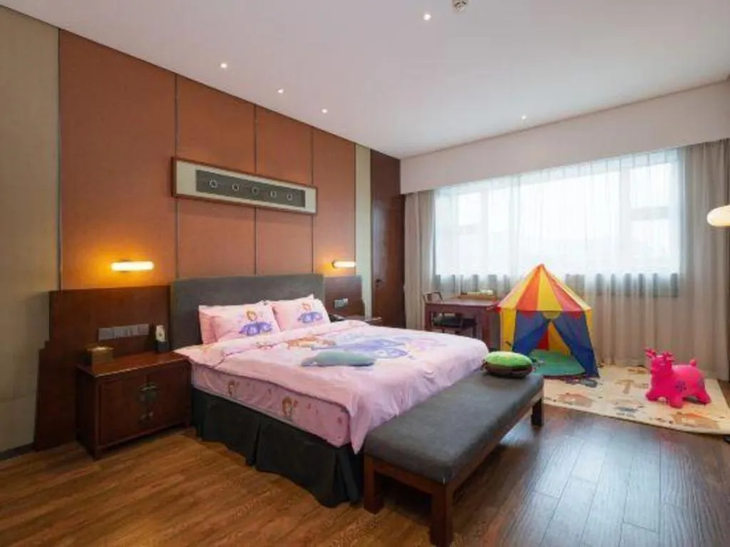 Bed in Rezen Hotel Pasonda Junyu