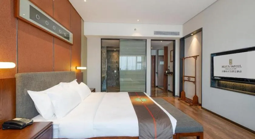 Bed in Rezen Hotel Pasonda Junyu