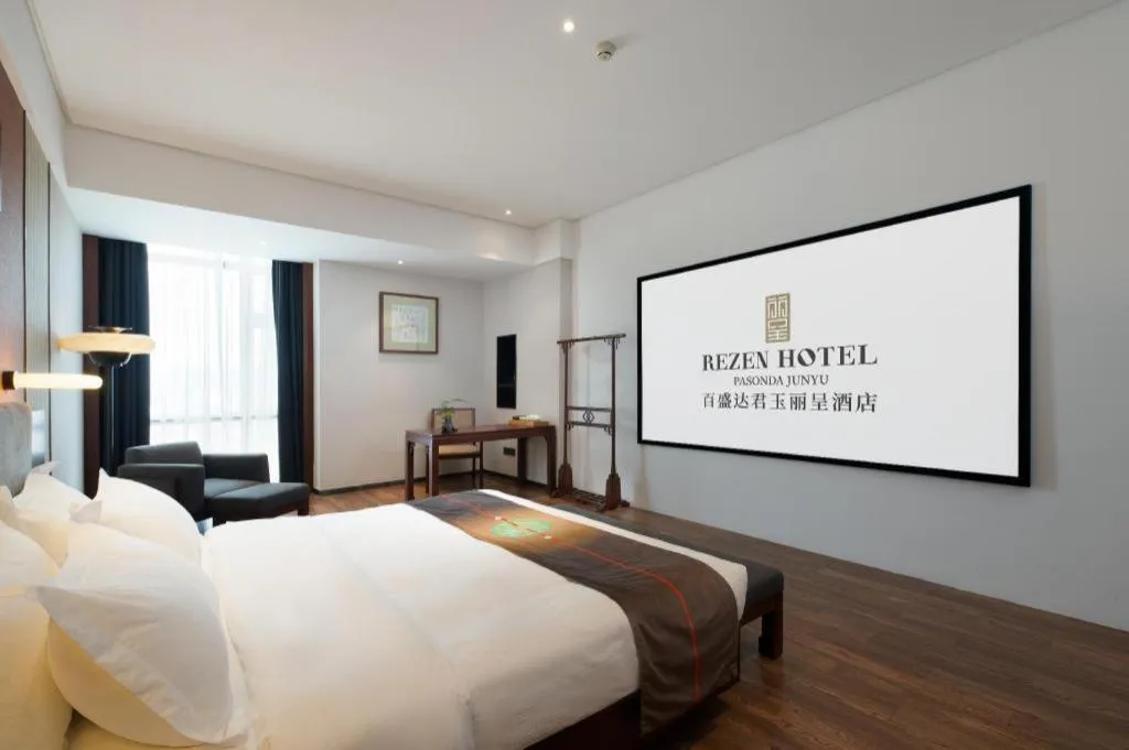 Bed in Rezen Hotel Pasonda Junyu