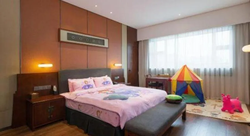 Bed in Rezen Hotel Pasonda Junyu