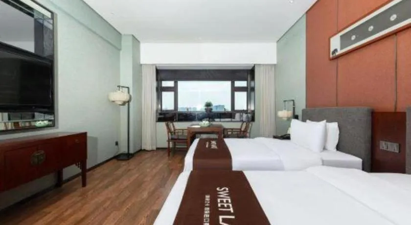 Bed in Rezen Hotel Pasonda Junyu