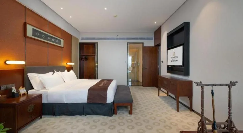 Bed in Rezen Hotel Pasonda Junyu