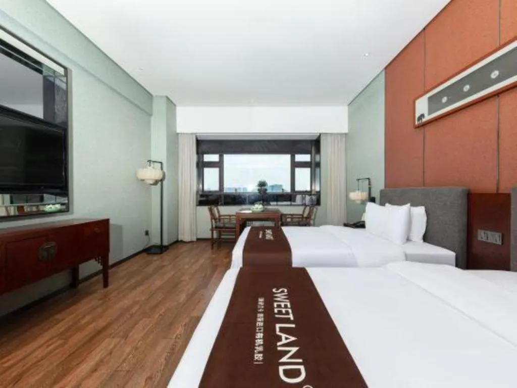 Bed in Rezen Hotel Pasonda Junyu