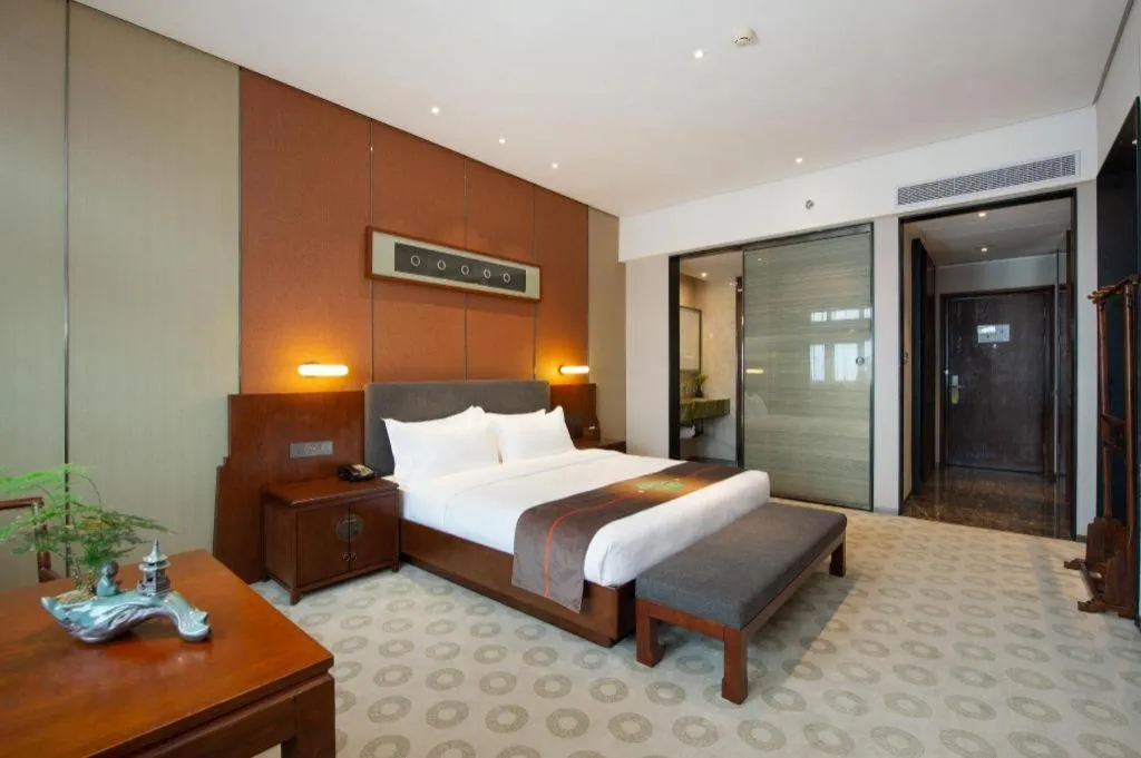 Bed in Rezen Hotel Pasonda Junyu