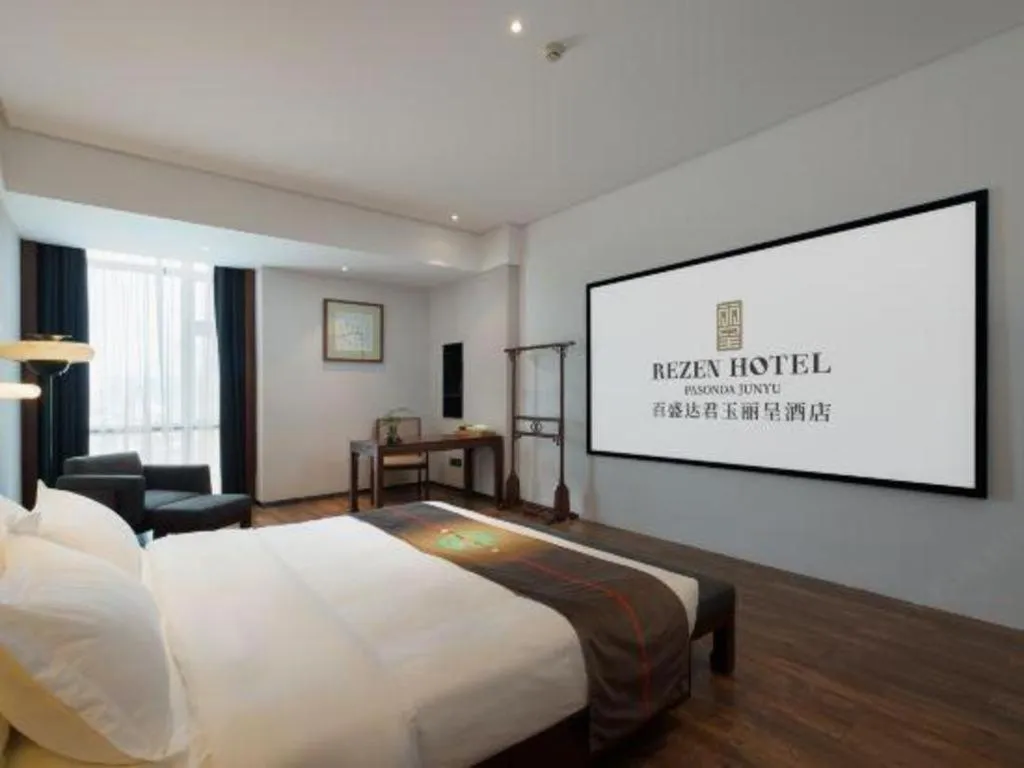 Bed in Rezen Hotel Pasonda Junyu