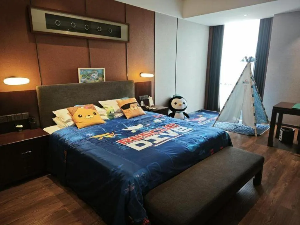 Bed in Rezen Hotel Pasonda Junyu