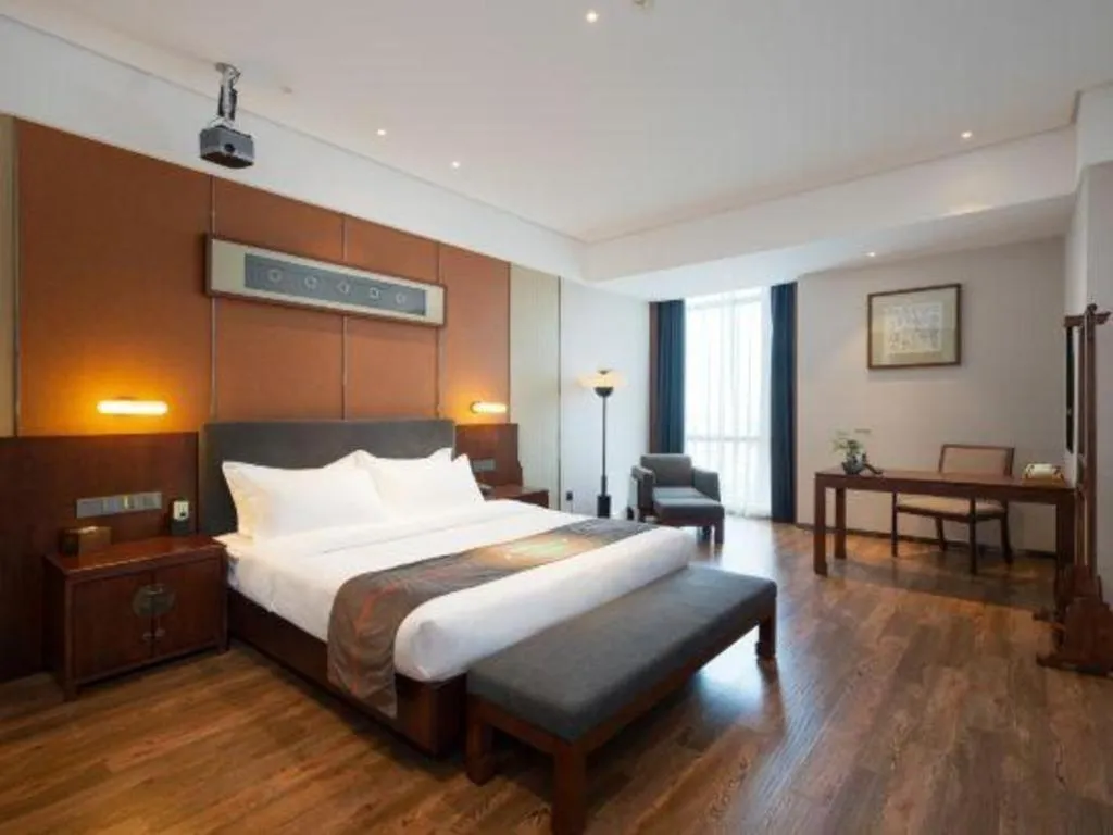 Bed in Rezen Hotel Pasonda Junyu