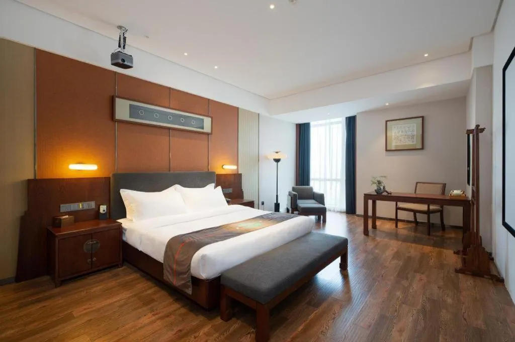 Bed in Rezen Hotel Pasonda Junyu