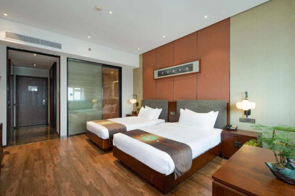 Bed in Rezen Hotel Pasonda Junyu