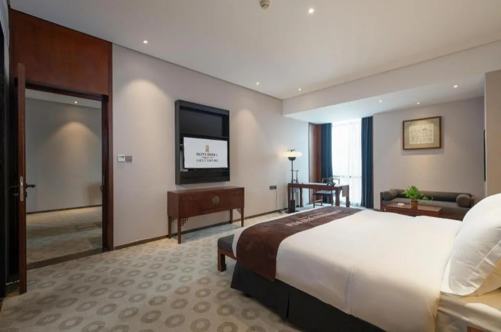 Bed in Rezen Hotel Pasonda Junyu