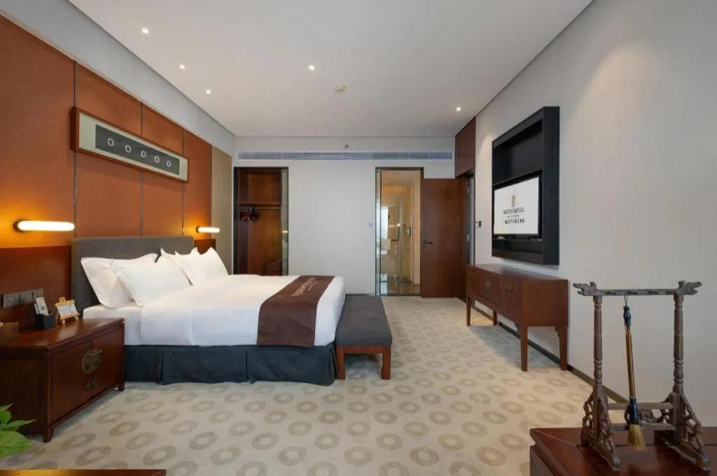 Bed in Rezen Hotel Pasonda Junyu