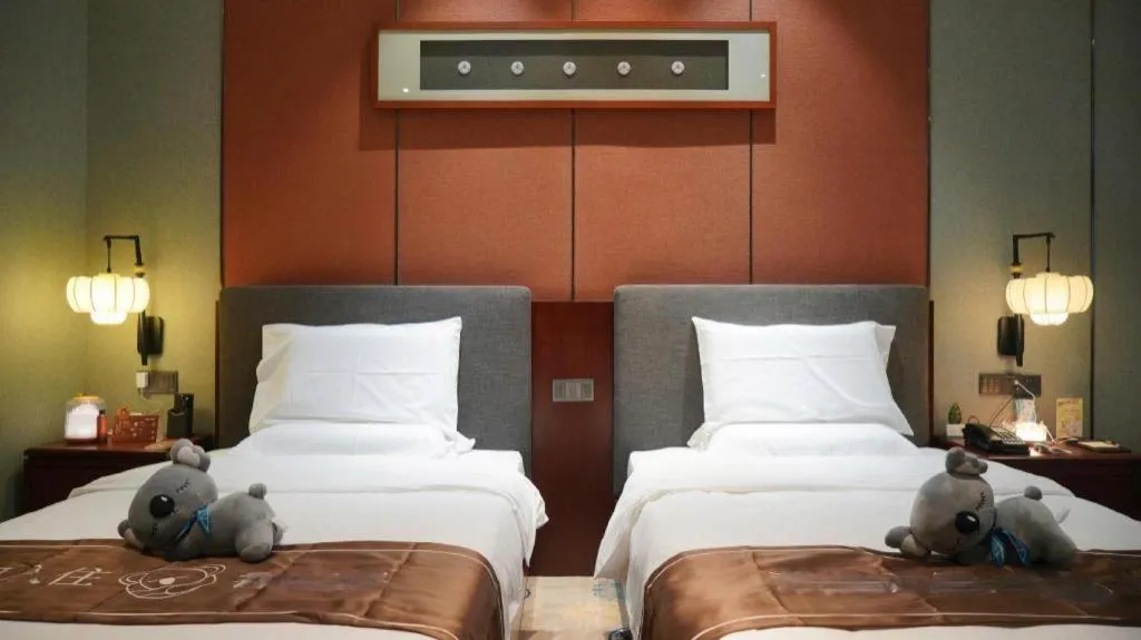 Bed in Rezen Hotel Pasonda Junyu