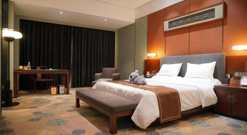 Bed in Rezen Hotel Pasonda Junyu