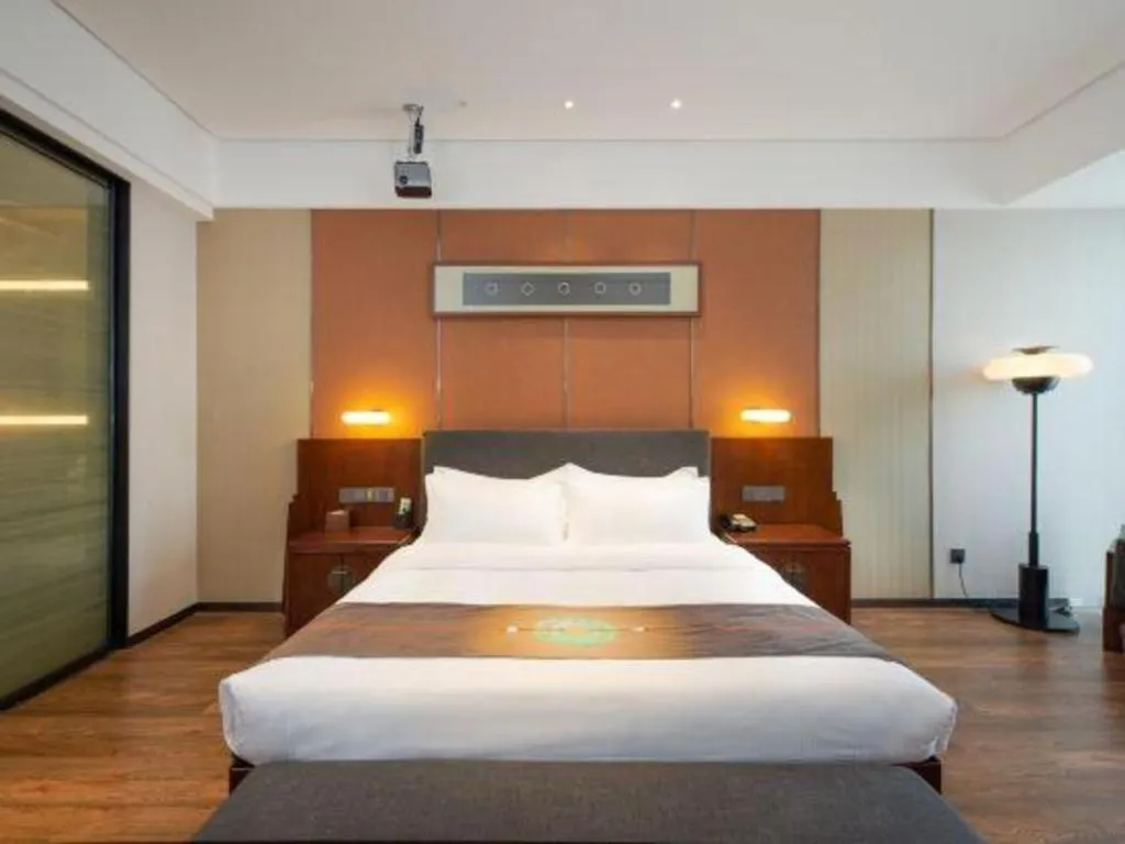 Bed in Rezen Hotel Pasonda Junyu