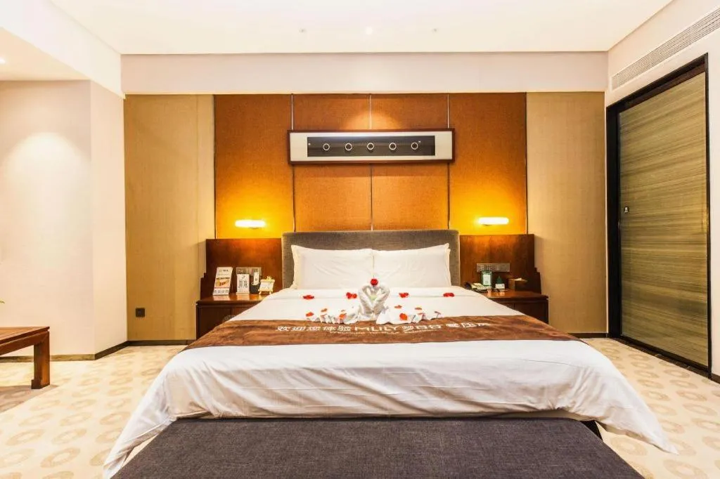 Bed in Rezen Hotel Pasonda Junyu