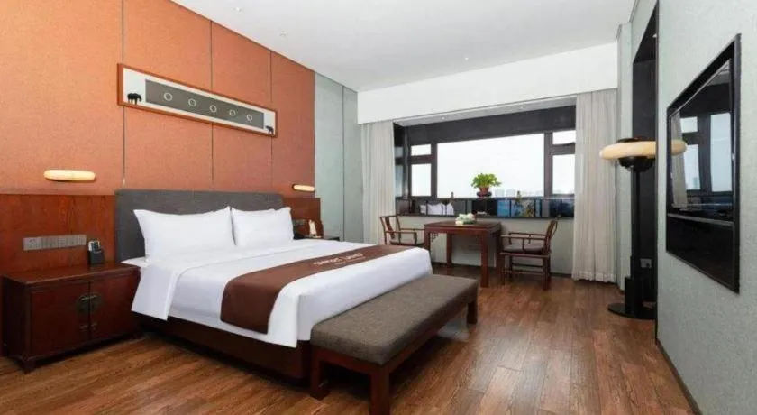 Bed in Rezen Hotel Pasonda Junyu