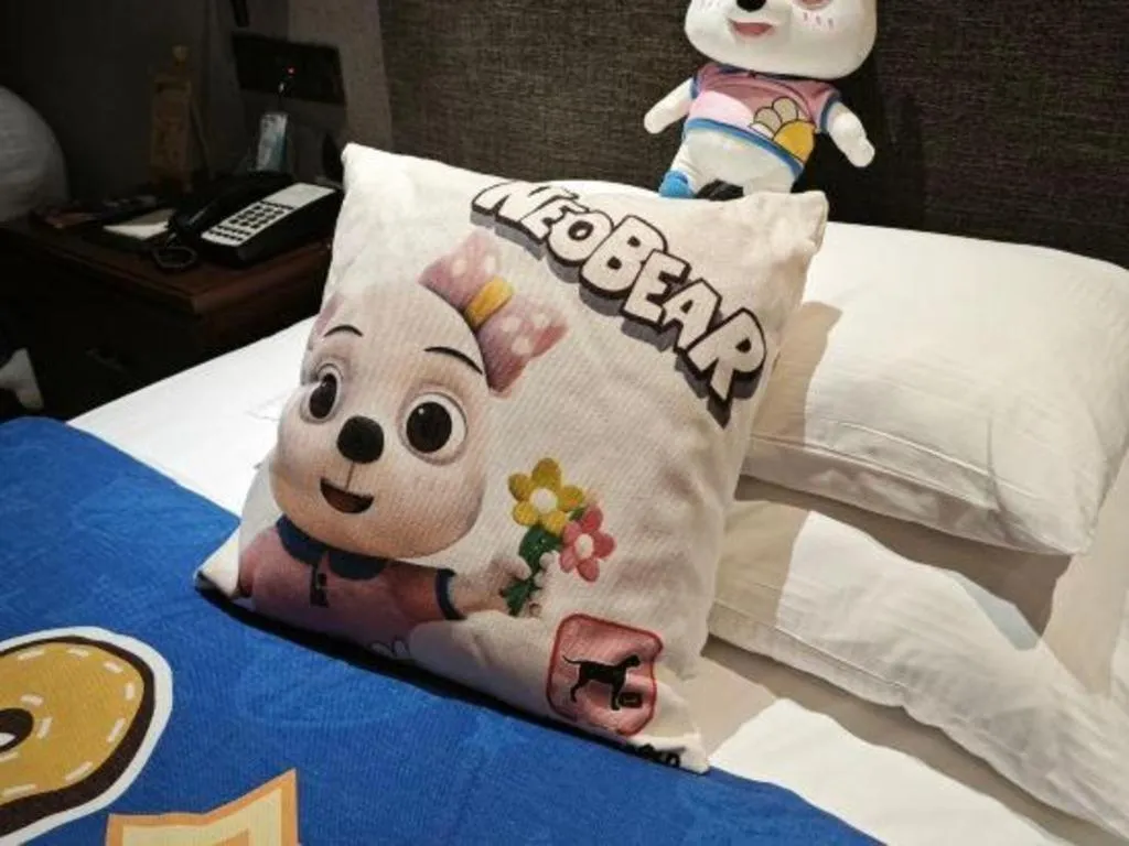 Bed in Rezen Hotel Pasonda Junyu