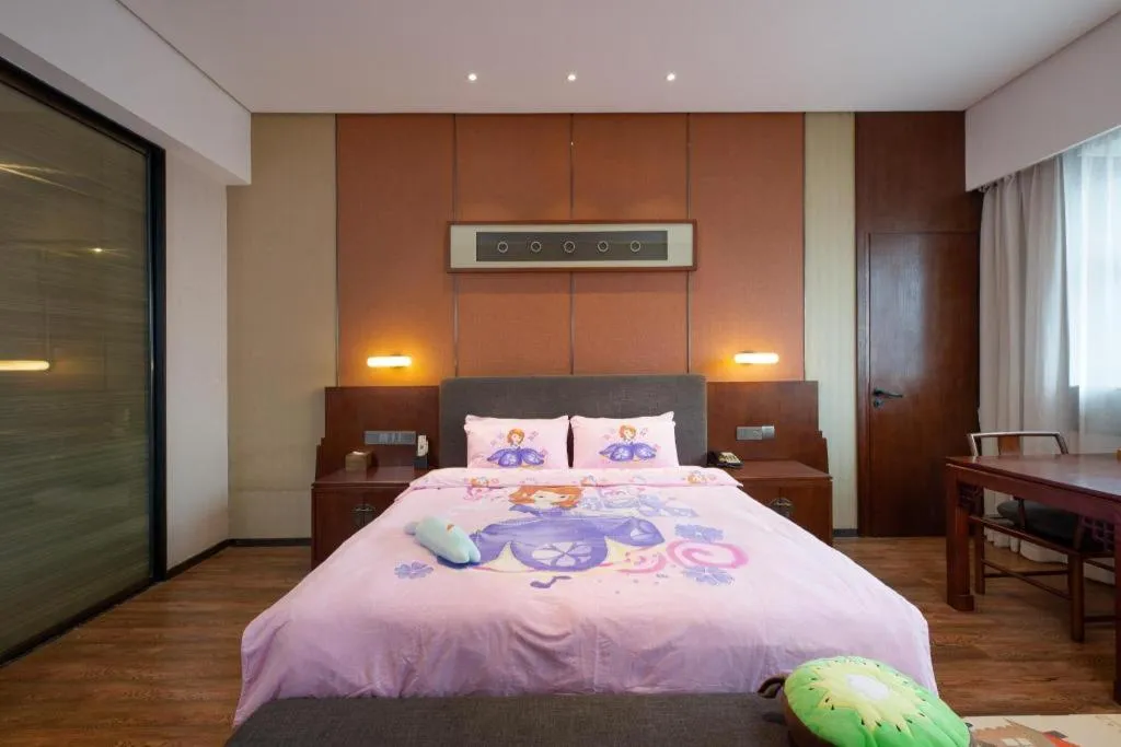 Bed in Rezen Hotel Pasonda Junyu