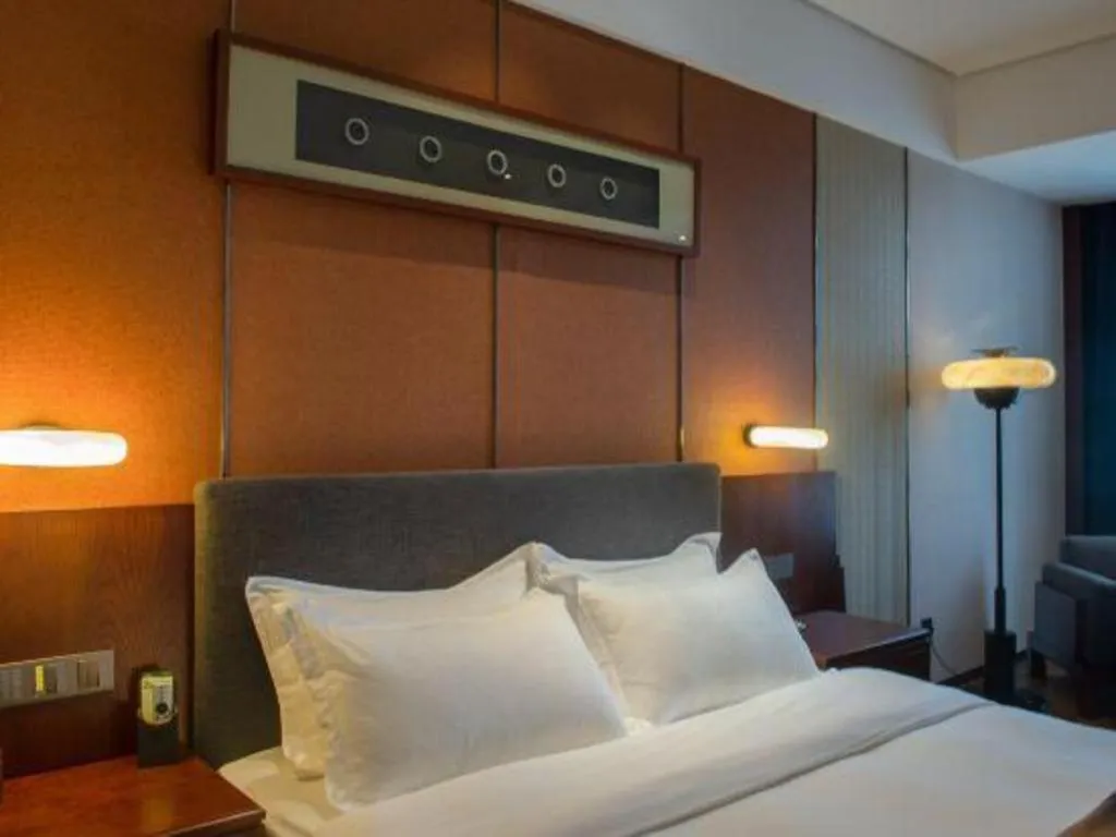 Bed in Rezen Hotel Pasonda Junyu