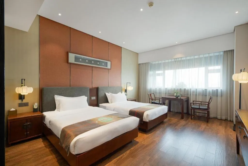 Bed in Rezen Hotel Pasonda Junyu