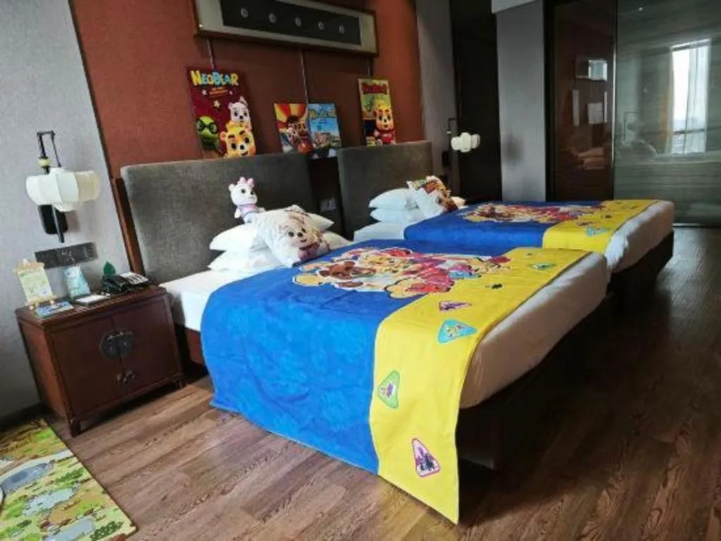 Bed in Rezen Hotel Pasonda Junyu