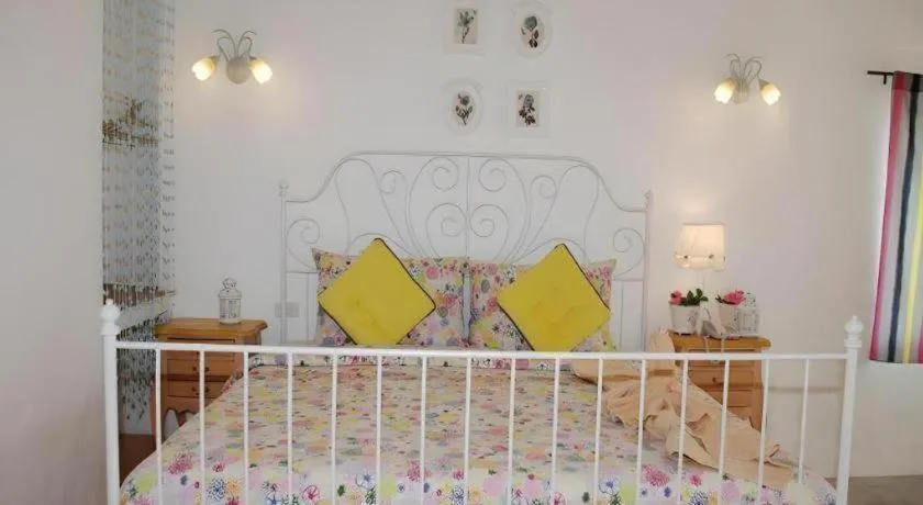 Bed in Rak Na Suan Pueng Resort