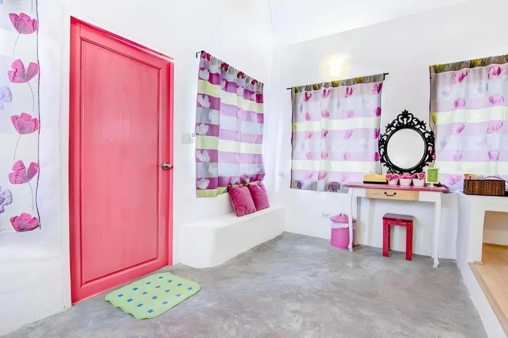 Bed in Rak Na Suan Pueng Resort