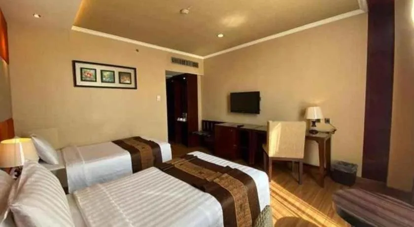 Bed in Regent's Park Hotel at Kayutangan Malang