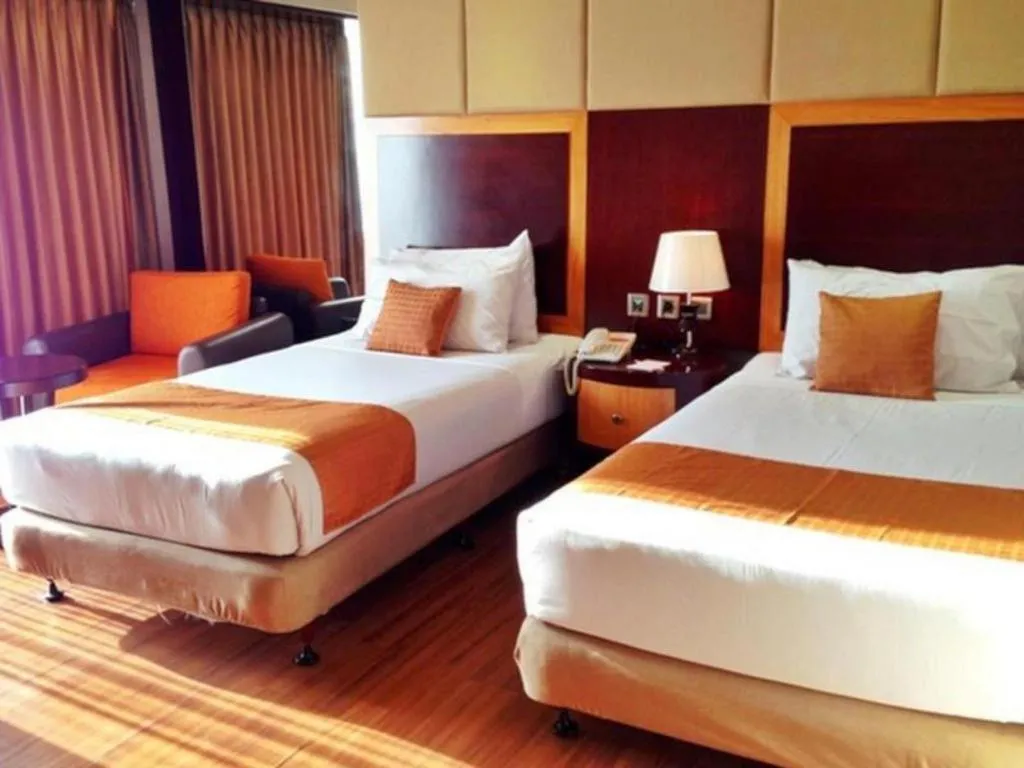 Bed in Regent's Park Hotel at Kayutangan Malang